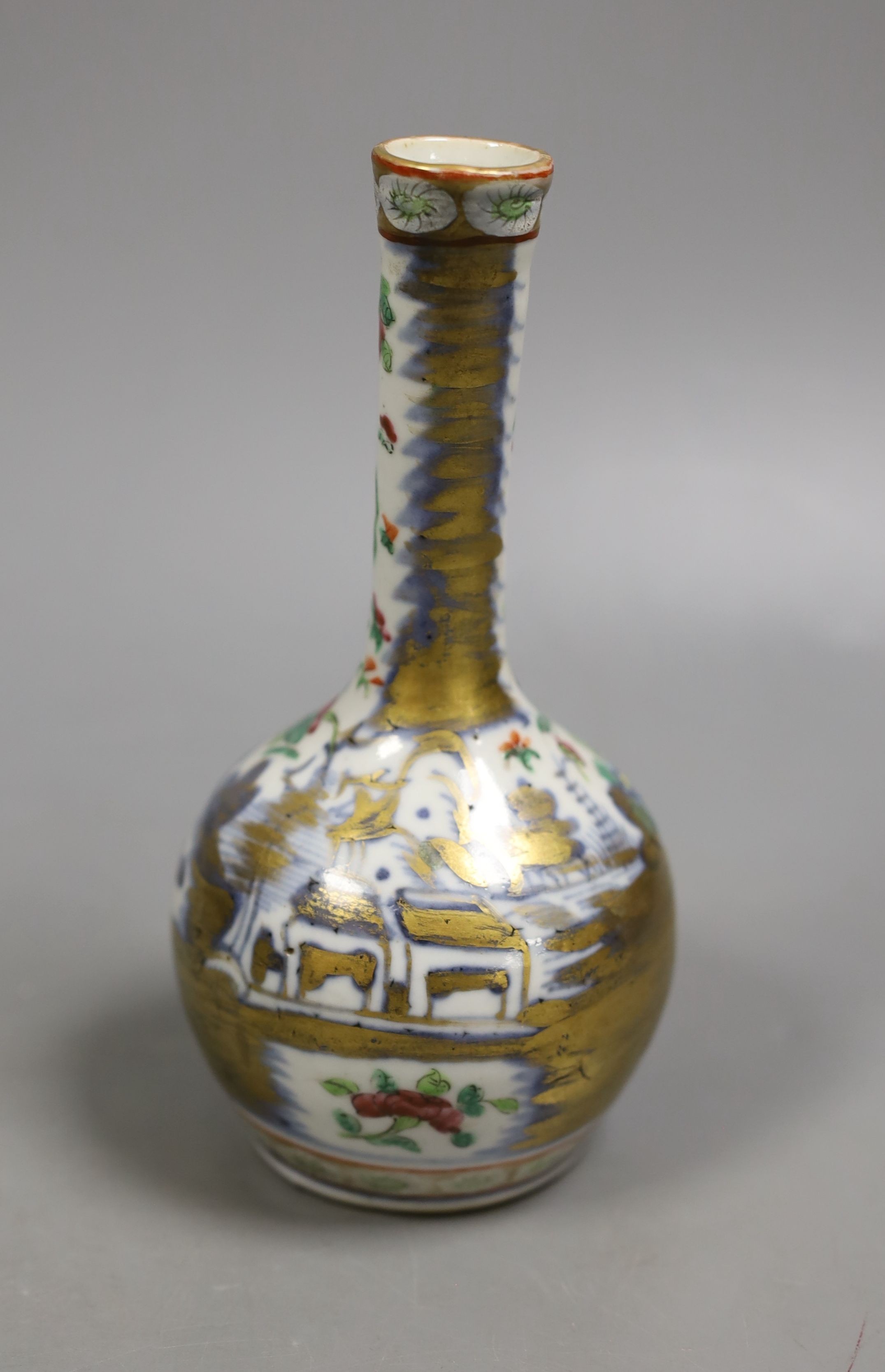 A 19th century Chinese famille rose bottle vase (dogs of fo), 17 cms high.